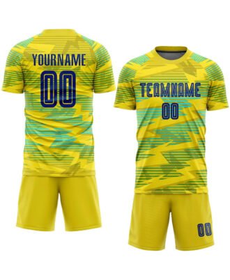 Yellow custom soccer jersey and shorts set with graphic design, player name and number